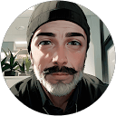 Plumber fixing pipe in Canberra home.